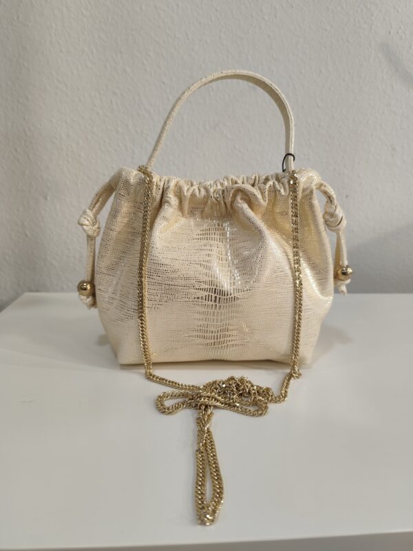 Bolso mano dorado Dura & Dura